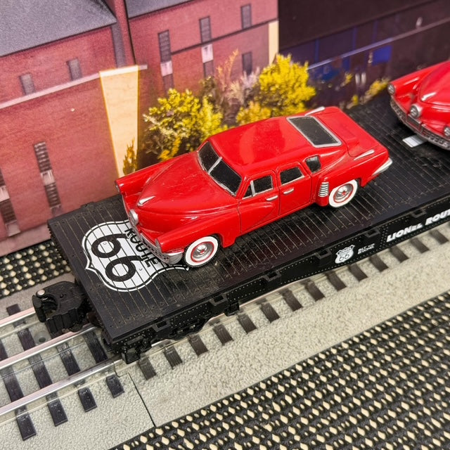 #1596 Lionel O Gauge Route 66 Flatcar with Two Red Classic Cars
