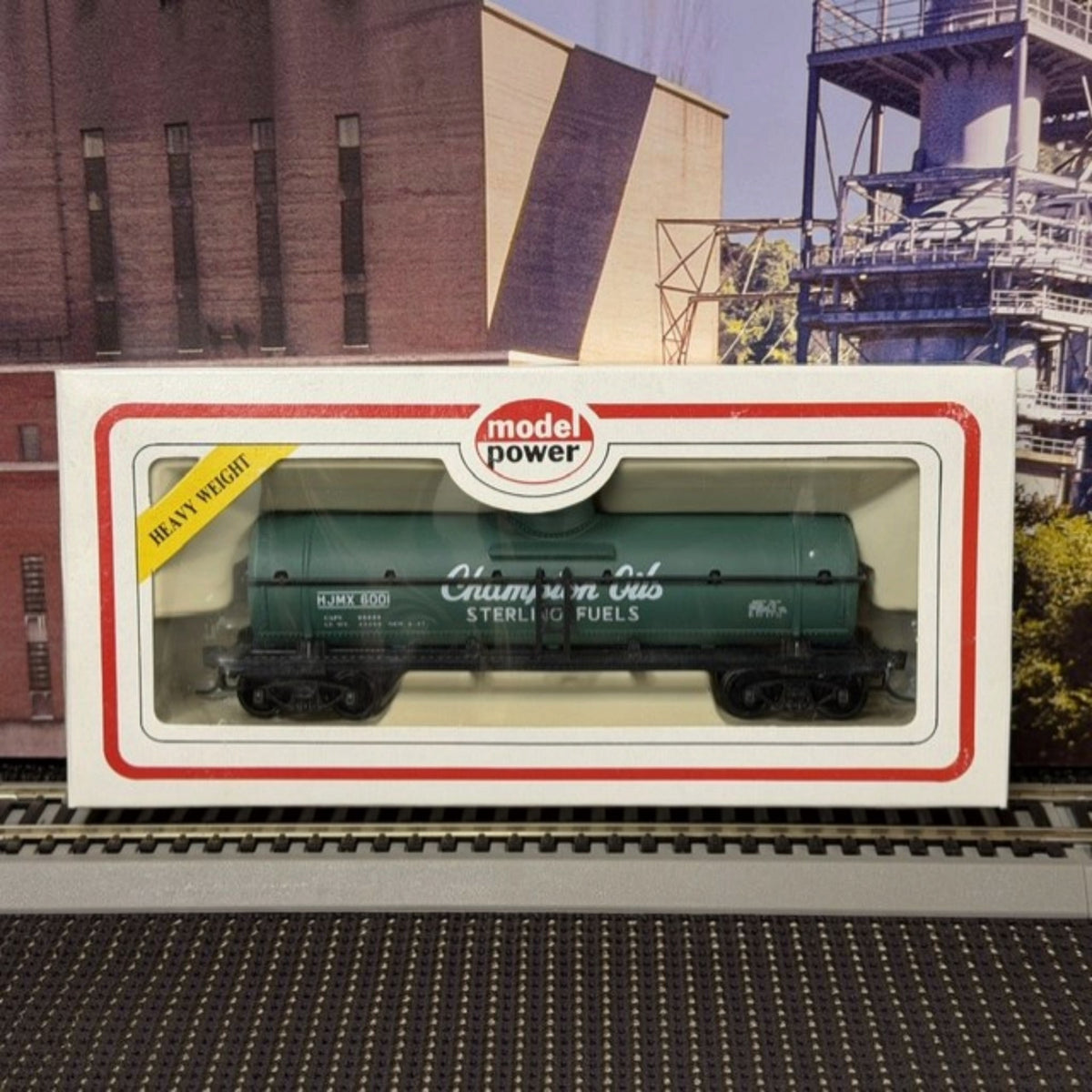 #1605 Model Power HO Scale Champion Oils / Sterling Fuels Tank Car