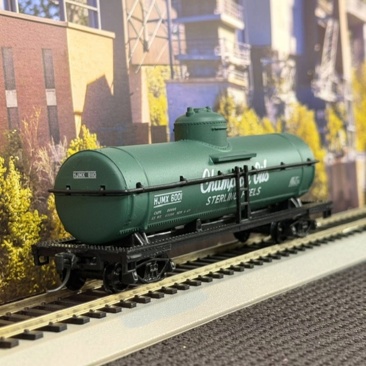 #1605 Model Power HO Scale Champion Oils / Sterling Fuels Tank Car