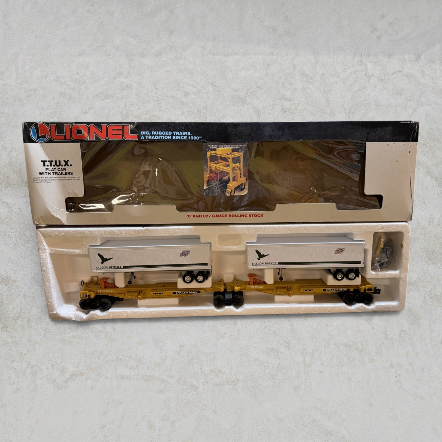 #1288 Lionel 6-18338 T.T.U.X. Flat Car with Falcon Service Trailers – O & O27 Gauge Piggyback Set w/ Original Box