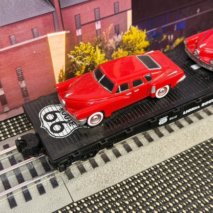 #1596 Lionel O Gauge Route 66 Flatcar with Two Red Classic Cars