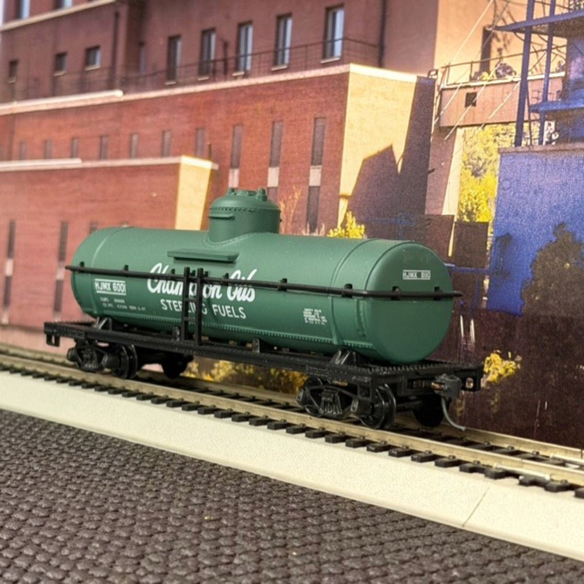 #1605 Model Power HO Scale Champion Oils / Sterling Fuels Tank Car