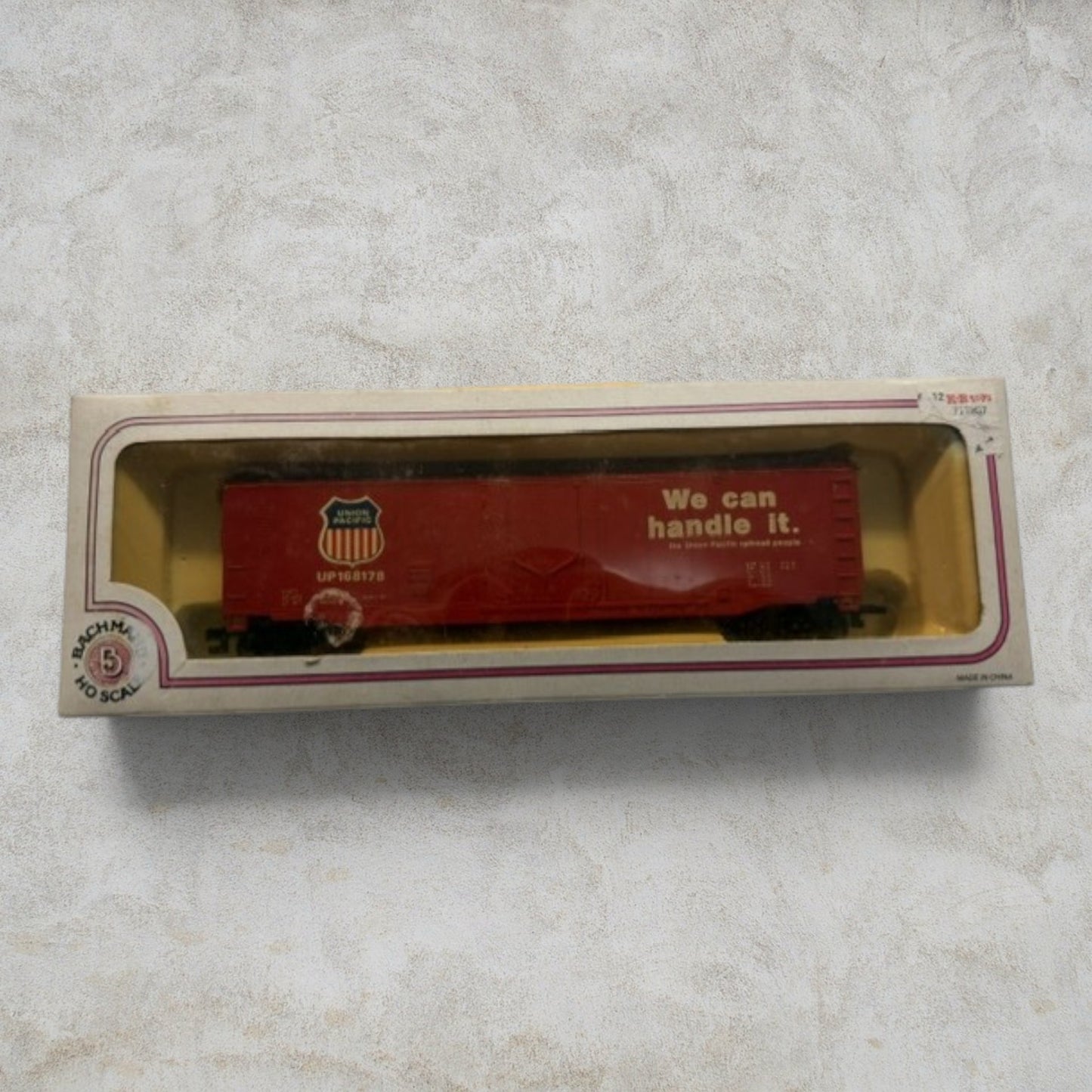 #1189 Bachmann HO Scale Union Pacific 51' Plug-Door Box Car – "We Can Handle It" – UP #168178 – Item #76036 – Ready-to-Run with Original Box