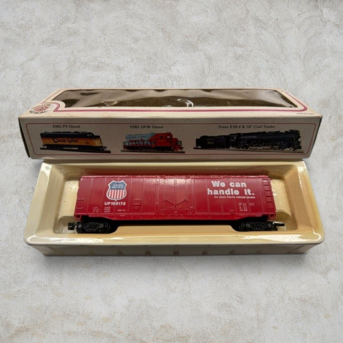 #1189 Bachmann HO Scale Union Pacific 51' Plug-Door Box Car – "We Can Handle It" – UP #168178 – Item #76036 – Ready-to-Run with Original Box