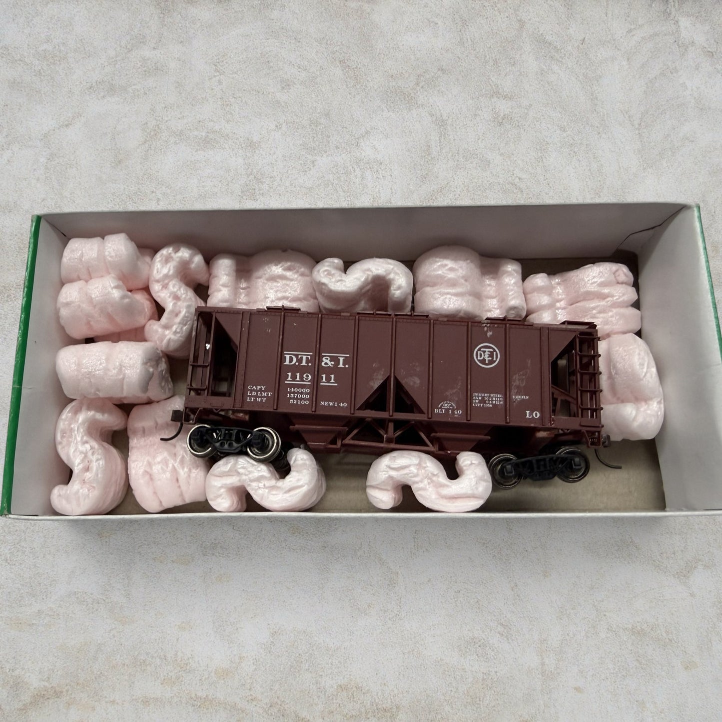 #1128 Bowser HO Scale D.T.&I. 70-Ton 2-Bay Covered Hopper #56455 – Detroit, Toledo & Ironton #11911 – Ready-to-Run